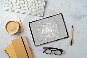 Chat bot and artificial intelligence technology concept with digital tablet, coffee cup and notebooks. Top view, flat lay