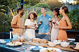 Chat, friends at dinner in garden at party and celebration with diversity, food and wine at outdoor event. Conversation