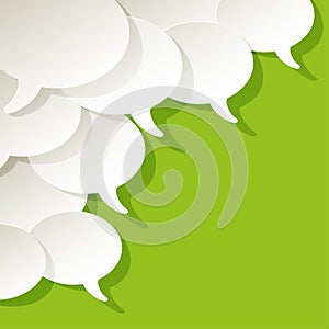 Chat speech bubbles ellipse vector white in the corner on a green background.