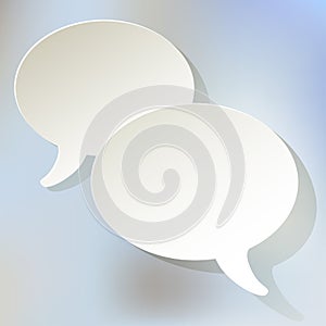 Chat speech bubbles ellipse vector white on a light blue bokeh background.