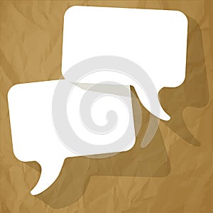 Chat speech bubbles white Free Space on a crumpled paper brown background