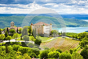 chateau and church in Aiguines and St Croix Lake at background