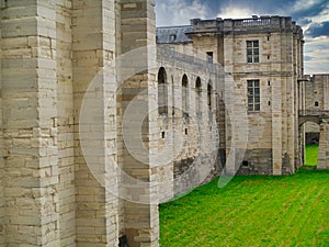 Chateau de Vincennes view of dry moat towards stone bridge entrance.