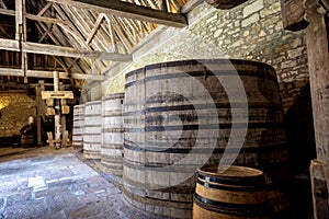 Chateau du Clos de Vougeot. Old casks of a winery. Cote de Nuits, Burgundy, France.