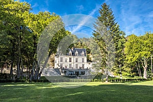 Chateau Gaillard Amboise surrounded by beautiful forest park with renaissance garden on the foreground. Loire valley, France.