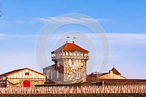 Chateau Smith haute Lafitte, wine tasting main building and wine making facilities on either side and one vinyard in forground