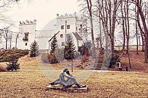 Chateau Strazky and statue of lovers, red filter