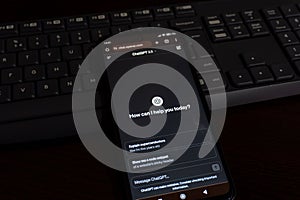 ChatGPT, a prototype AI chatbot, is seen on the website of OpenAI, on a smartphone