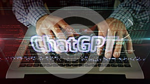 ChatGPT sign with man typing on the computer photo