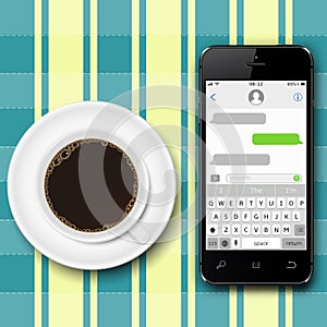 Chating and messaging concept. Smartphone with sms chat on screen and coffee cup on the tablecloth.