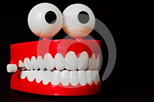 Chattering teeth toy from three quarter looking right