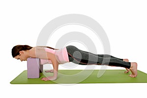 Chaturanga Dandasana -Four-Limbed Staff Pose variation with yoga props â€“ belt or bloc