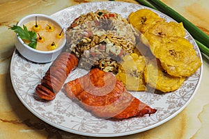 Chaufa Amazonico with jerky, chorizo and patacones, Peruvian cuisine from the jungle photo