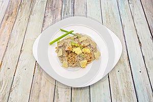 chaufa-style rice with diced French omelet, chicken pieces and vegetables photo