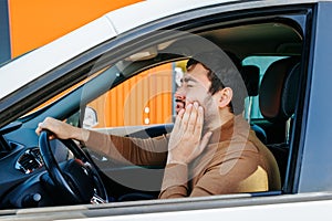 chauffeur bearded man feels severe pain, touching mouth agony he has toothache
