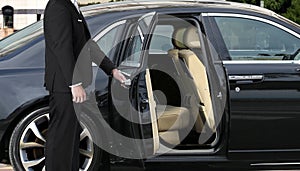 Chauffeur opening car door