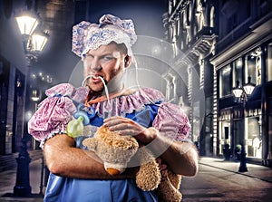 Chav man weared as baby