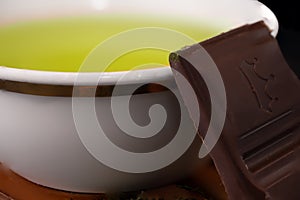 Chawan on a wooden stand with chocolate