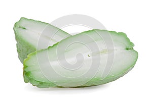 Chayote cut in half showing the pulp or flesh isolated on white background, cut out or cutout.