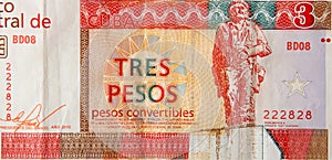 Che Guevara monument on cuban banknote of orange three pesos convertibles 2016