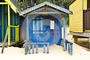 cheap beach hut sand covered england