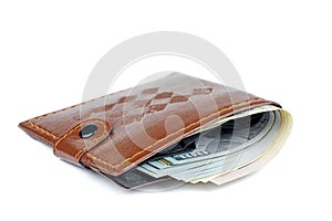 Cheap brown wallet with $100 bills