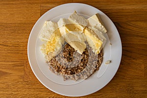 Cheap food of a poor country. Boiled buckwheat and egg casserole