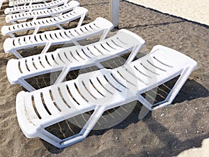 Cheap paid sun loungers at beach resort