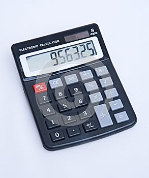 Cheap solar powered electronic calculator. photo