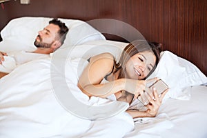 Cheating woman texting her lover