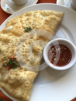 Cheburek with meat, pepper and dill