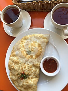 Cheburek with meat, pepper and dill