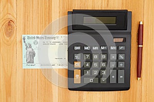 Check for either a federal tax refund or Social Security payment with a calculator and pen