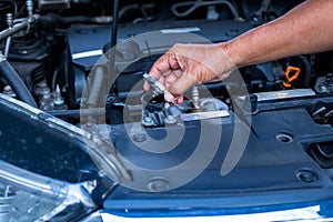 Check and maintenance the water in radiator car with yourself