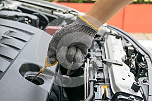 Check the oil level in car engine