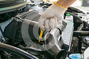 Check the oil level in engine