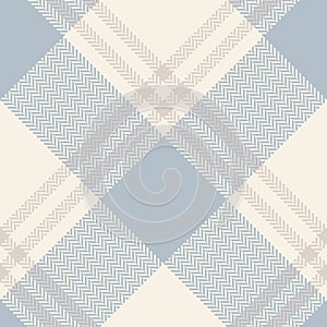 Check plaid pattern texture in soft pale cashmere blue and beige. Seamless large diagonal light herringbone tartan plaid.