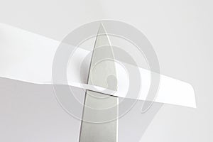 Check the sharpening of knife blades on paper