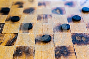 Checker game pieces, concepts of struggle, strategy and confrontation