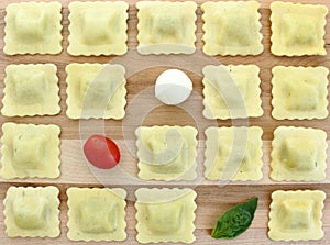 Checkerboard ravioli with tomato, bocconcini and basil
