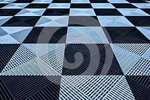 Checkered black and white tile pattern