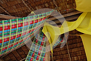 Checkered cloth banner hanging in the ceiling