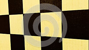 Checkered dichromic wall in perspective