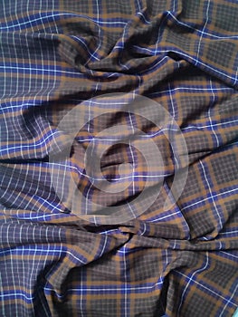 blue and brown checkered striped fabric pattern and background