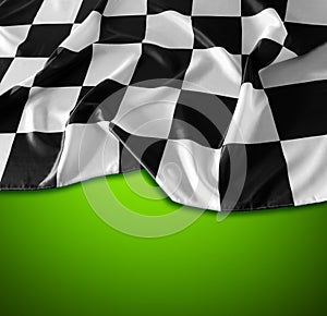 Checkered flag on green