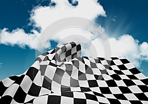 Checkered flag waving against cloudy sky