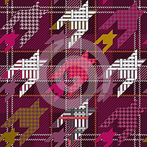 Checkered textile print with hounds tooth motifs.