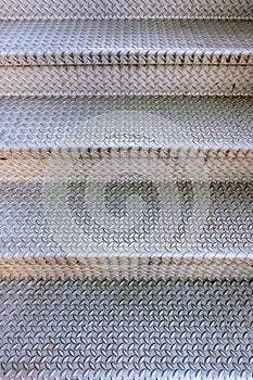 Checkerplate metal stairs; background pattern photo