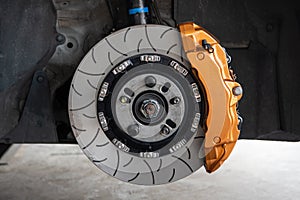 Checking car brake system for repair at car garage