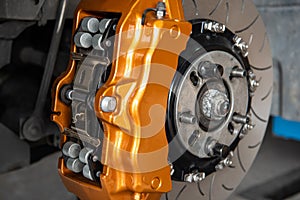 Checking car brake system for repair at car garage